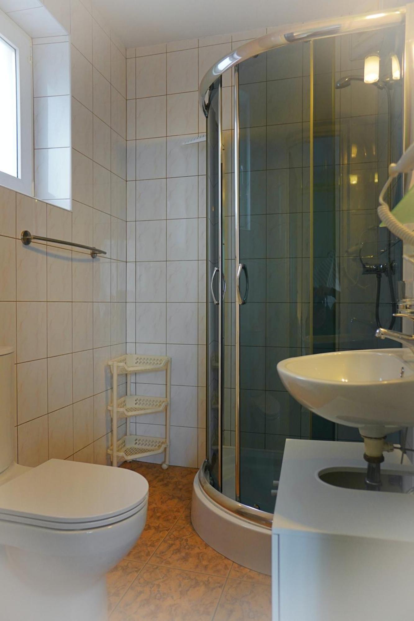 Iwona Pokoje Apartamenty Карвиа Стая снимка